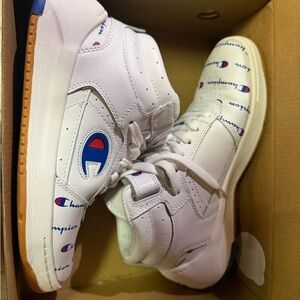 Champion woman’s White and Blue high top Sneakers